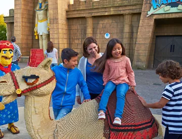 Family on LEGO Camel in Kingdom of the Pharoahs
