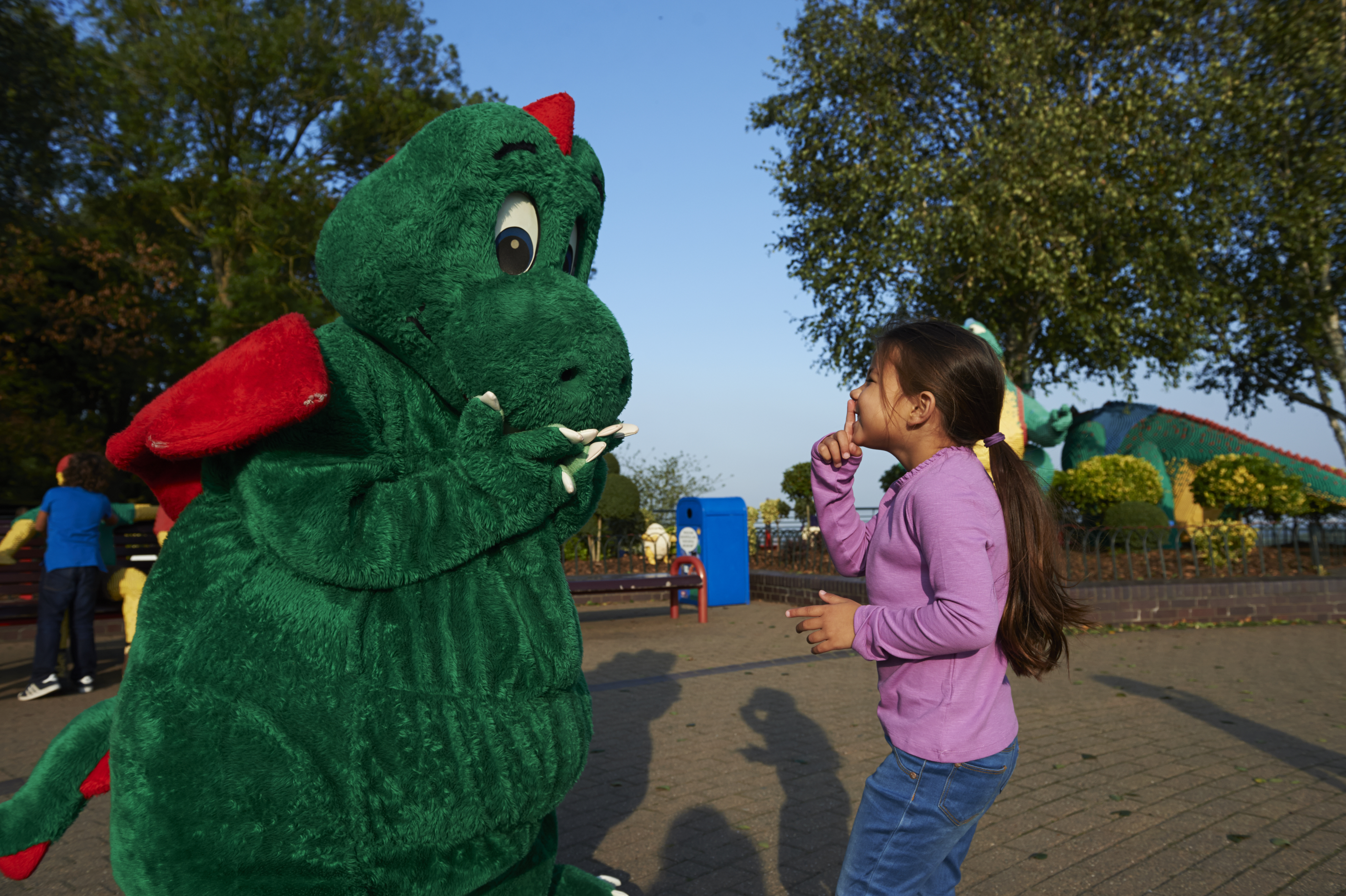 Girl meeting Ollie the Dragon