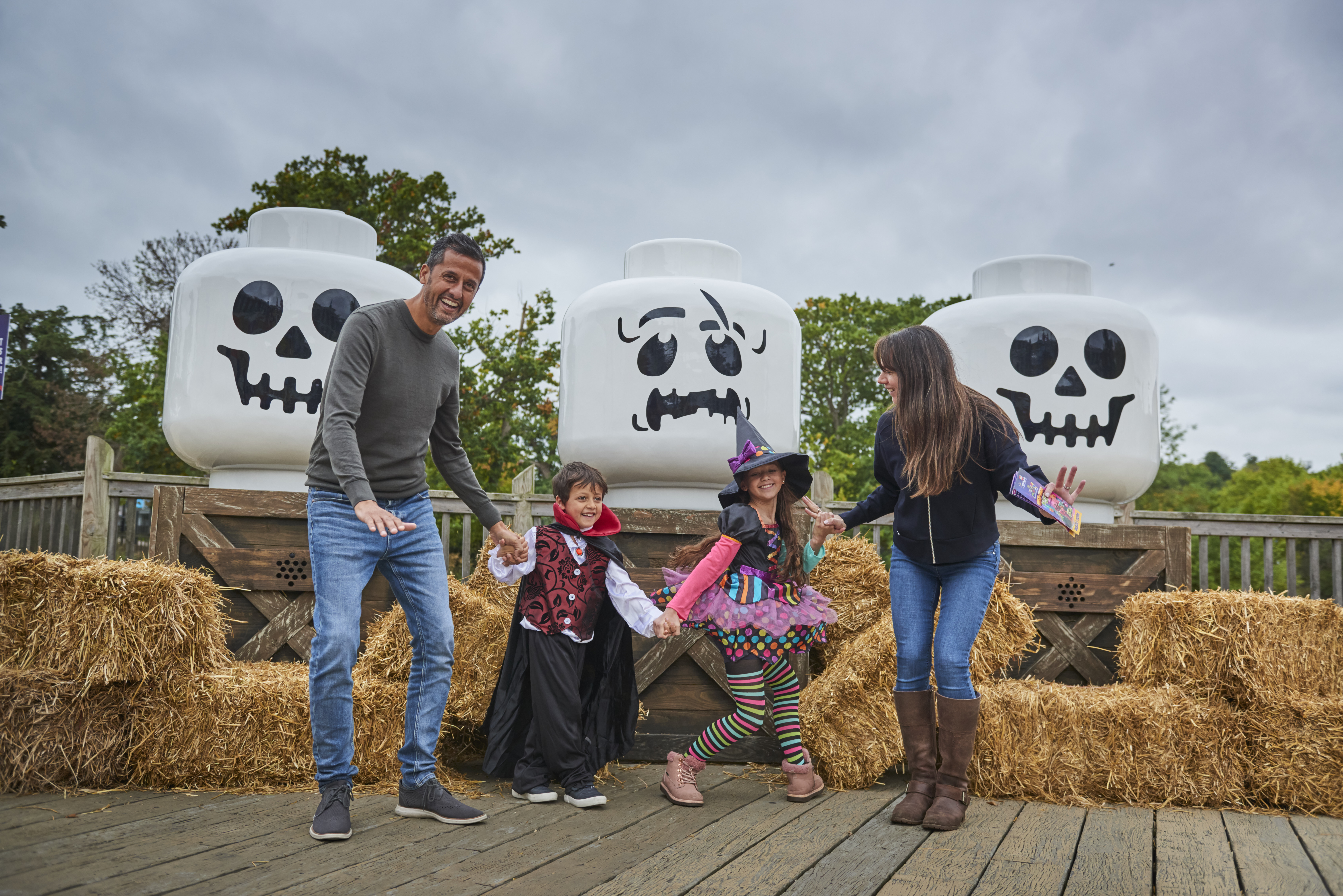 Family With Skeleton Heads At Brick Or Treat