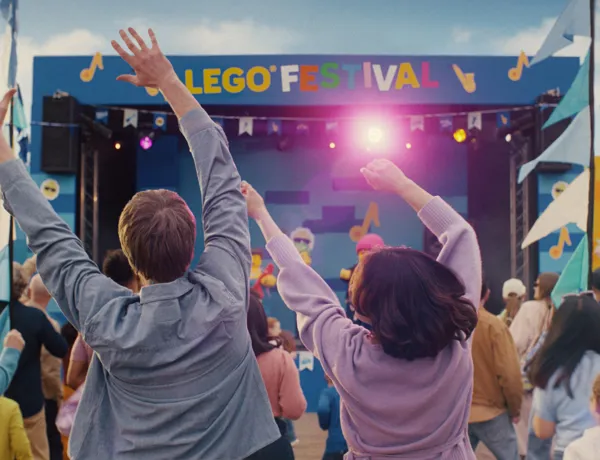 Mum and Dad dancing in front of LEGO Festival stage