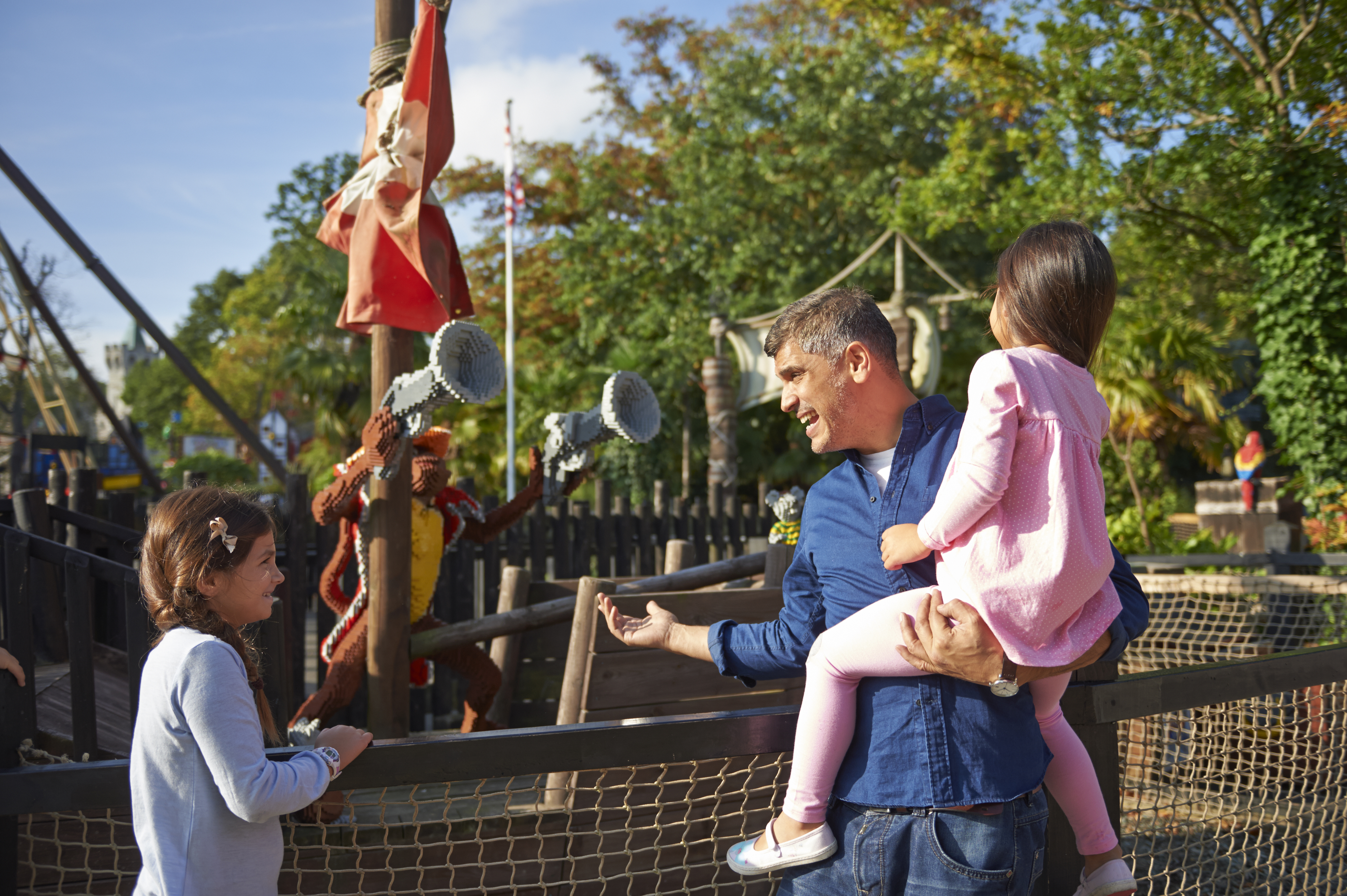 Family looking at LEGO models in Pirate Shores at the LEGOLAND Windsor Resort