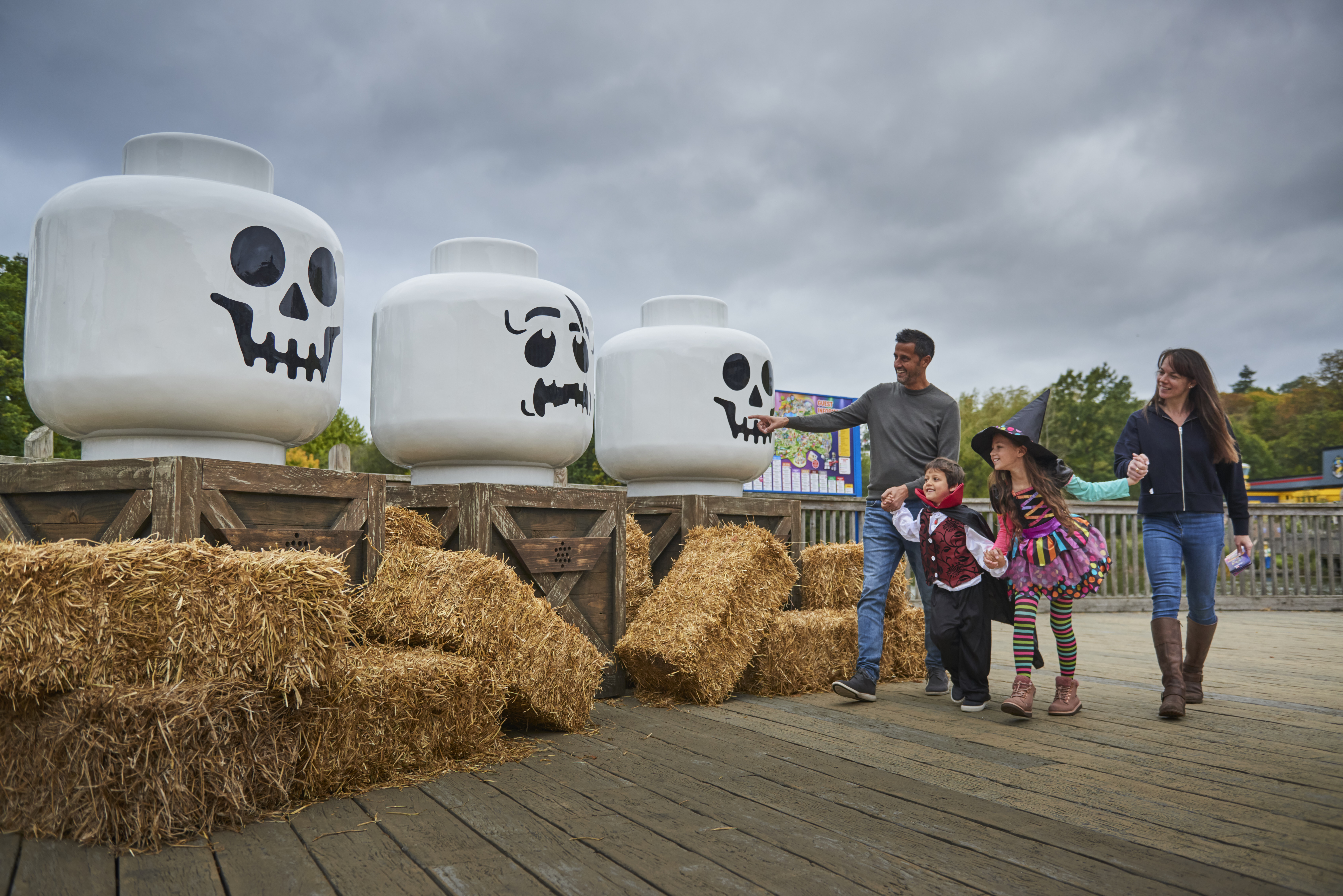 Family With Skeleton Heads At Brick Or Treat