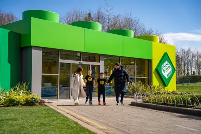 Family Outside The Brick At The LEGOLAND Windsor Resort