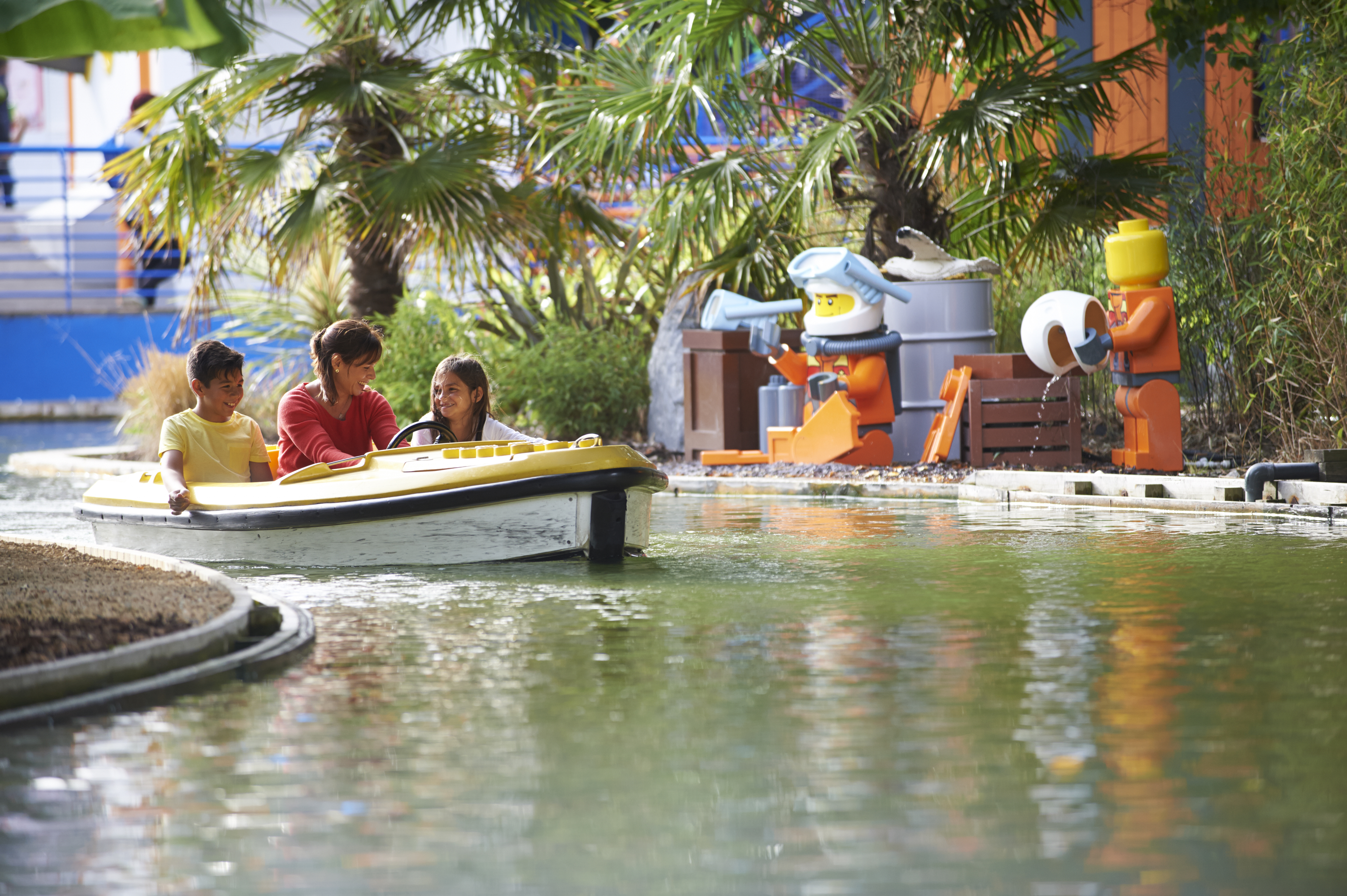 Family in boat at Coastguard HQ at the LEGOLAND Windsor Resort