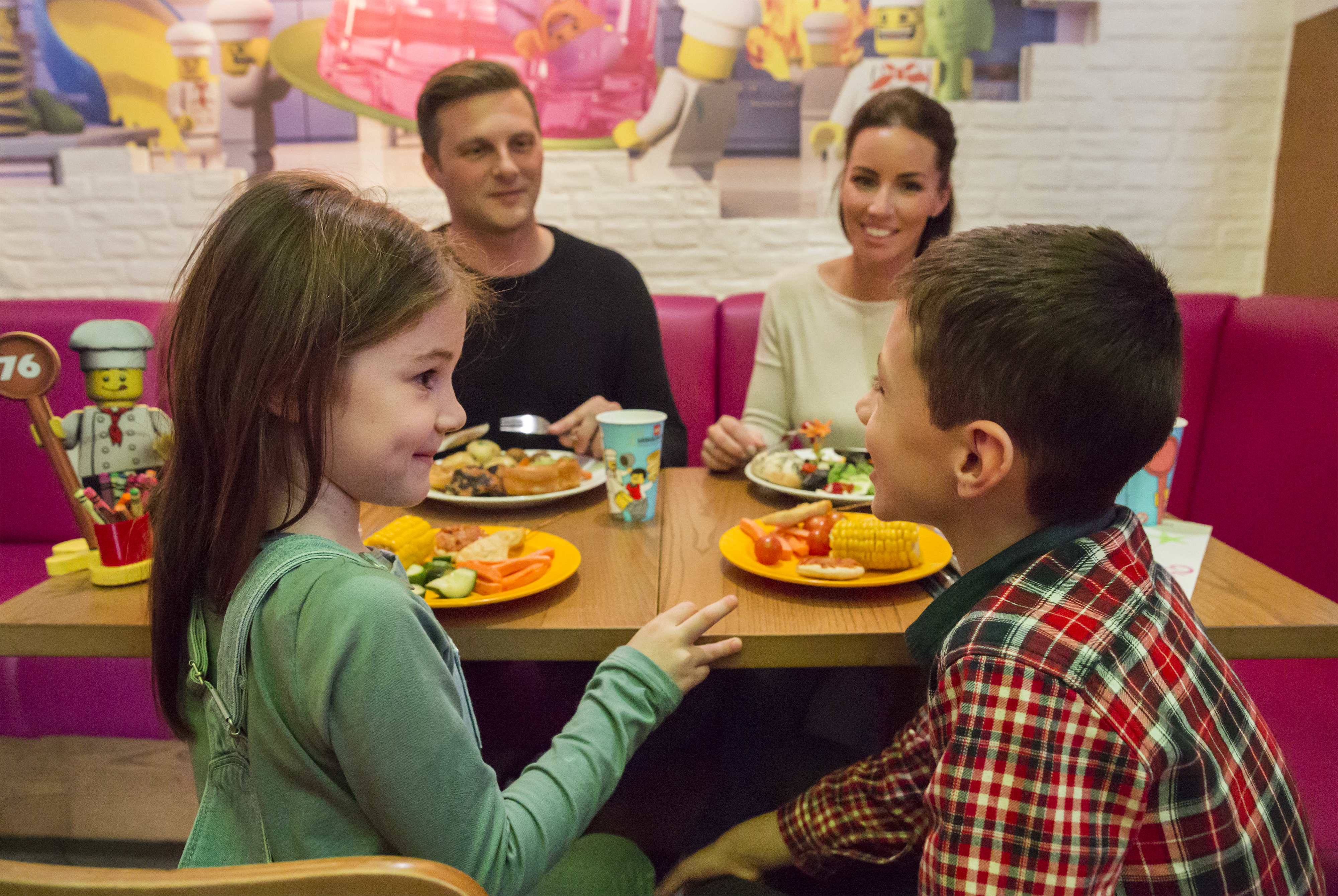 Family enjoying dinner at Bricks Restaurant